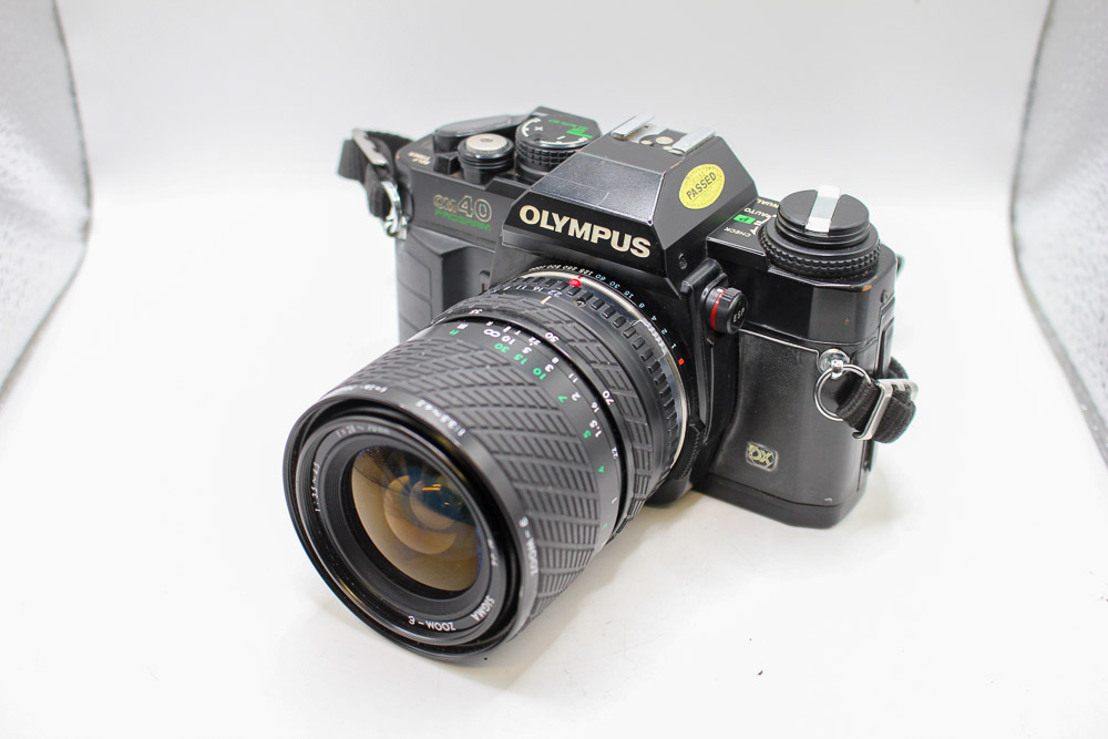 Olympus OM-40 Program + Sigma 28-70 Zoom Lens (Used)